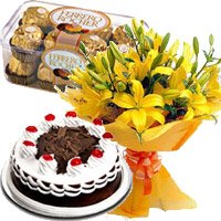 Same Day Cakes to Jammu. 12 Yellow Lily, 1/2 Kg Black Forest Cake, 16 Pcs Ferrero Rocher